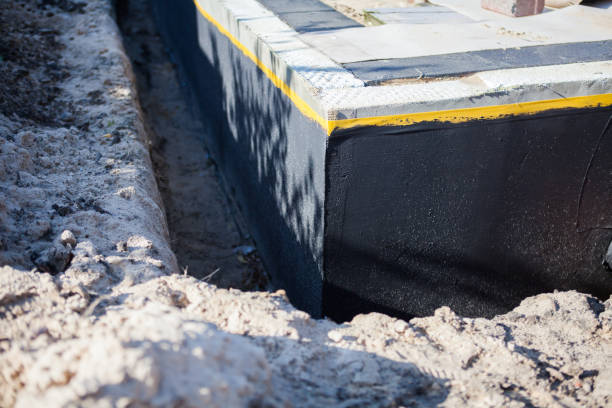 Professional Waterproofing technician working in Tilton, IL
